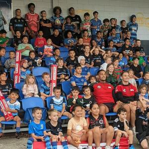 Some of the kids in the Cookson Family stand.